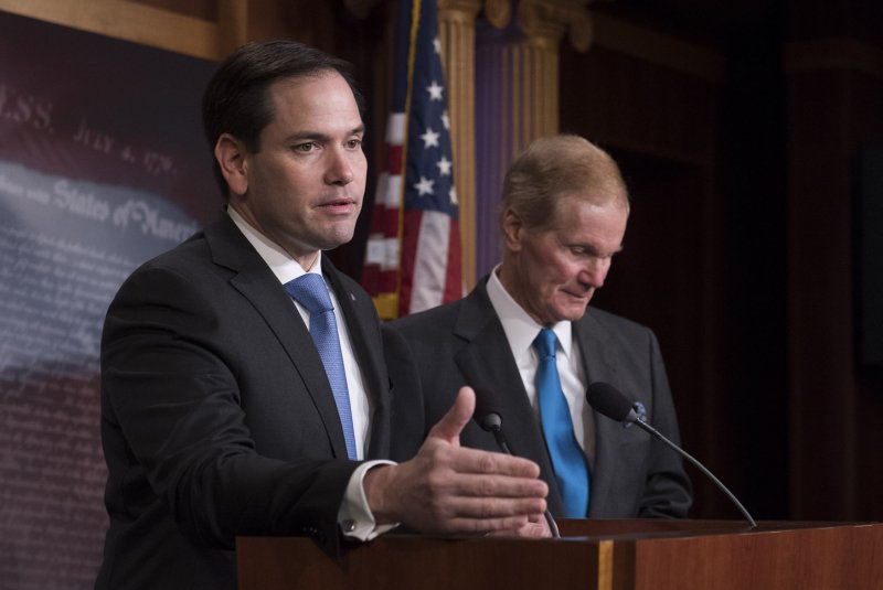 Sen. Marco Rubio, R-Fla., (L) and Sen. Bill Nelson, D-Fla., speak at a press conference to introduce their joint gun violence restraining order bill Wednesday on Capitol Hill in Washington, D.C. Photo by Kevin Dietsch/UPI | <a href="/News_Photos/lp/a423a45d0307eb9fa06b6a7289d26f34/" target="_blank">License Photo</a>