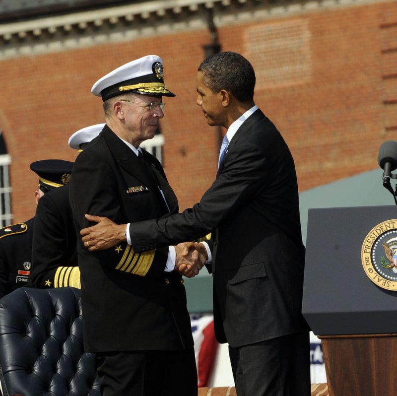 US President Barack Obama shakes hands with Adm. Mike Mullen during the Armed Forces Farewell Tribute and Swearing-in Ceremony in honor of the 17th and 18th Chairman of the Joint Chiefs of Staff, at Fort Meyer, on Friday, September 30, 2011, in Arlington, VA. UPI/Leslie E. Kossoff/POOL
