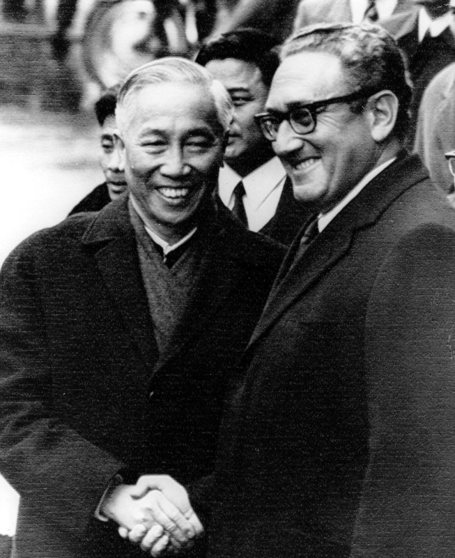 U.S. presidential adviser Henry Kissinger (R) and Hanoi's Lo Duc Tho smile broadly following their January 23, 1973, meeting at the International Conference Center in Paris. Four days later, the two countries signed a cease-fire agreement. UPI File Photo