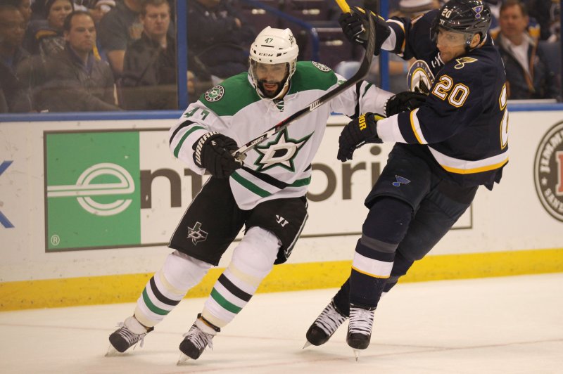 Dallas Stars' Johnny Oduya pushes off of St. Louis Blues' Alexander Steen in the first period at the Scottrade Center in St. Louis. File photo by Bill Greenblatt/UPI