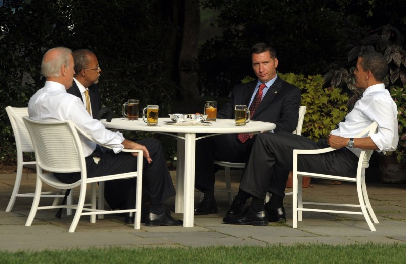 U.S. President Barack Obama (R) and Vice President Joe Biden (L) have a beer with Prof. Henry Louis Gates Jr., (LC) and Sgt. James Crowley (RC) in the Rose Garden of the White House in Washington on July 30, 2009. Last week Crowley arrested Gates in Gates' home. UPI Photo/Roger L. Wollenberg