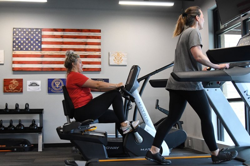 Researchers found that adults who regularly exercised were less likely to be hospitalized for such common ills as pneumonia, stroke, diabetes complications and severe urinary tract infections. File Photo by Ian Halperin/UPI