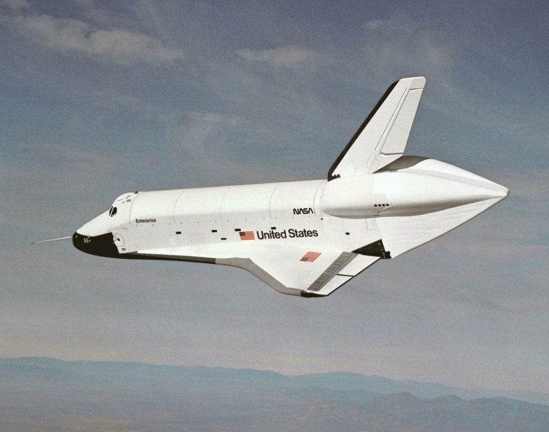 The Space Shuttle prototype Enterprise flies free of NASA's 747 Shuttle Carrier Aircraft (SCA) during one of five free flights carried out at the Dryden Flight Research Facility, Edwards, Calif., Oct. 12, 1977, as part of the Shuttle program's Approach and Landing Tests (ALT). UPI/NASA