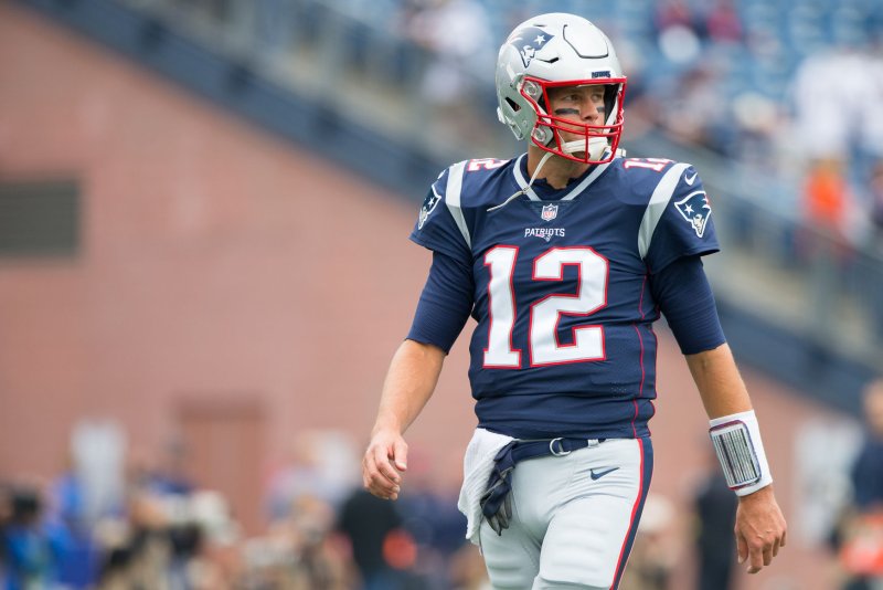 New England Patriots quarterback Tom Brady (12) looks down the field during warm-ups before a game at Gillette Stadium in Foxborough, Mass., on September 9. Photo by Matthew Healey/UPI