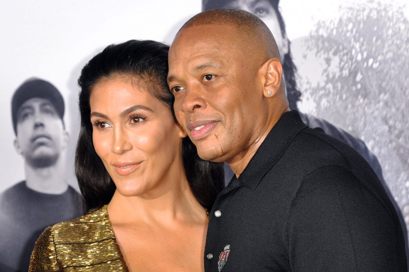 Dr. Dre finalized (R) his divorce from Nicole Young and will pay her $100 million under the terms of their settlement. File Photo by Christine Chew/UPI