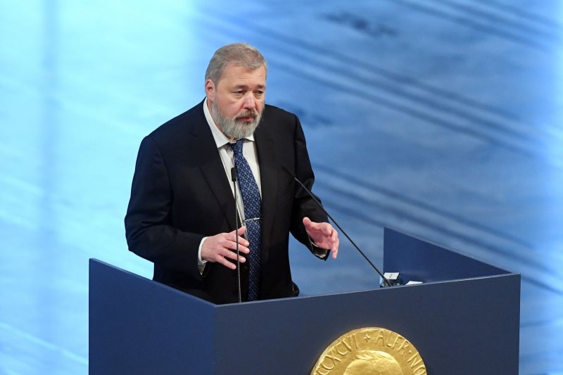Nobel Peace Prize laureates Russian journalist Dmitry Muratov attends the Nobel Peace Prize Award Ceremony at City Hall in Oslo on December 10, 2021. He will auction off his award on Monday to help refugee Ukrainian children. File Photo by Rune Hellestad/ UPI