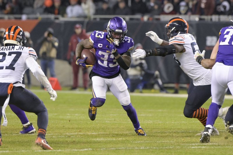 Former Minnesota Vikings running back Dalvin Cook (C) is one of the top free agents on the market this off-season. File Photo by Mark Black/UPI