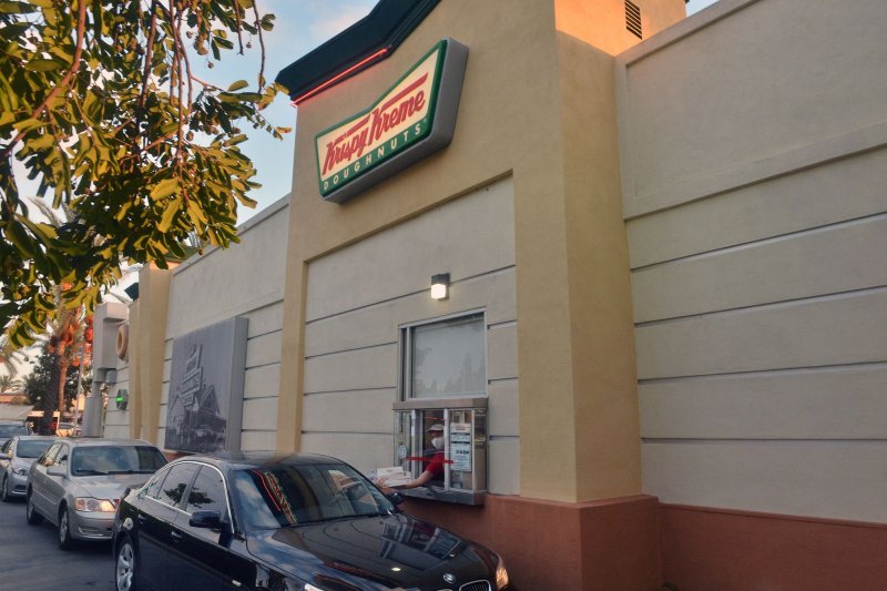 Krispy Kreme set its price for a glazed dozen at $4.11 on Wednesday to match the price of the national average of a gallon of regular gasoline in the United States. Krispy Kreme will set the price based on the national average on Mondays until May 4. File Photo by Jim Ruymen/UPI