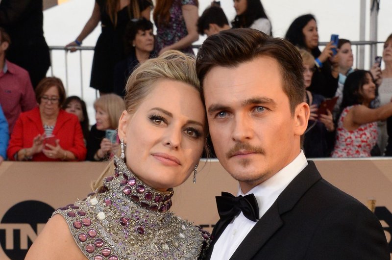 Rupert Friend, right, and Aimee Mullins attend the 22nd annual Screen Actors Guild Awards in 2016. The actor will star in " The Wonderful Story of Henry Sugar and Six More." File Photo by Jim Ruymen/UPI | <a href="/News_Photos/lp/6004b4ee10f93a7ed387b132f1c1ec1e/" target="_blank">License Photo</a>