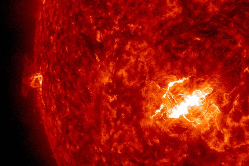 A strong flare erupted into space from an active region that was roughly facing towards Earth on March 11, 2015. Photo courtesy of NASA/SDO/UPI