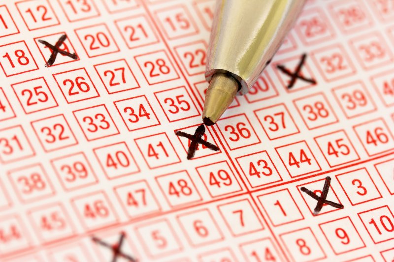 A Missouri woman won $7.5 million from a lottery ticket she bought just minutes before the drawing. File Photo by Robert Lessmann/Shutterstock
