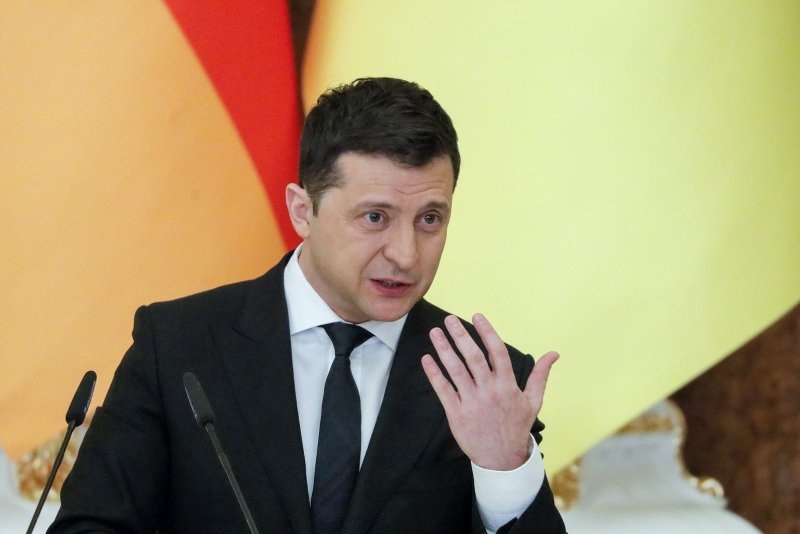 Ukrainian President Volodymyr Zelensky speaks during a joint press conference with German Chancellor Scholz following their meeting in Kiev on February 14. Zelensky on Saturday asked the United States to stop importing oil from Russia. File Photo by Sergey Dolzhenko/EPA-EFE