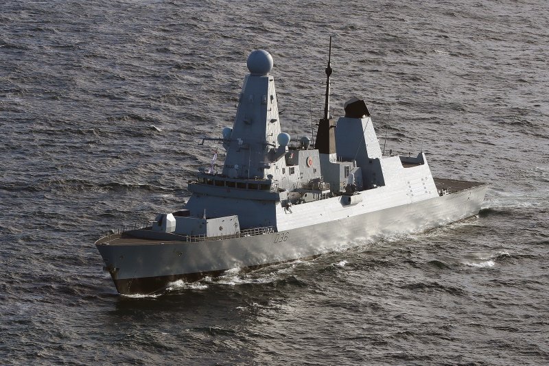 The Royal Navy warship HMS Defender is seen off the coast of Scotland on May 19, 2019. The Russian military said Wednesday it had to fire warning shots at the vessel because it veered too close to territorial waters. File Photo by Ben Shread/MoD/Crown Copyright/EPA-EFE