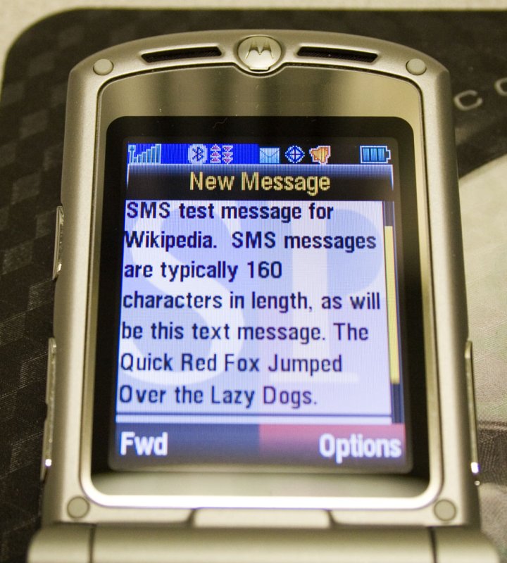 An SMS message is received on a Motorola RAZR handset. Photo by Scared Poet/<a href="https://commons.wikimedia.org/wiki/File:SMS_test.jpg" target="_blank">Wikimedia Commons</a>