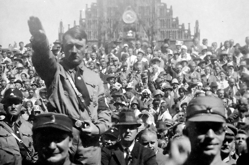 Adolf Hitler attends a Nazi Party rally in Nuremberg, Germany, in 1928. On September 28, 1938, Hitler called a four-power conference in Munich to discuss the Czechoslovak crisis, postponing the German army's march into Sudetenland. File Photo by NARA/UPI