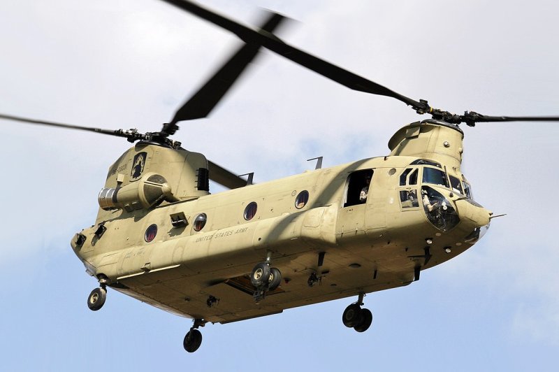 On August 6, 2011, Taliban insurgents in Afghanistan shot down a U.S. military Chinook transport helicopter similar to the one pictured, killing 30 Americans and eight Afghans. File Photo by Spc. Glenn M. Anderson/U.S. Army