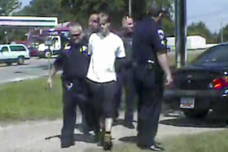 Charleston church shooting suspect Dylann Roof, seen here during his arrest in June 2015, appeared in court Monday for the fourth day of his federal murder trial. During arguments, prosecutors presented evidence purportedly collected from Roof's vehicle in Shelby, N.C., on the day of his arrest. Included among the items, prosecutors said, was a list of other churches in the Charleston area. File Photo courtesy Shelby Police Dept./European Pressphoto Agency