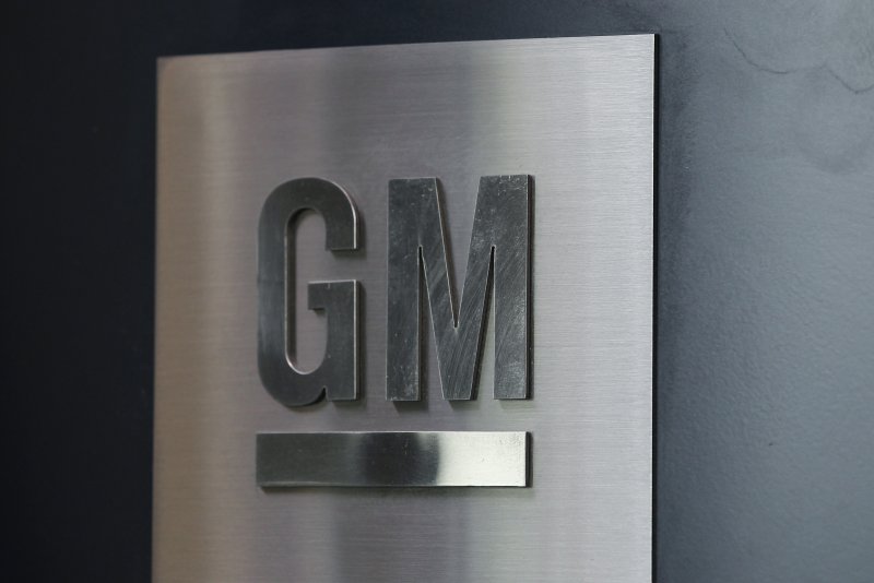 General Motors logo is displayed in their global headquarters at the Renaissance Center in Detroit on June 12, 2012. GM announced a recall of more than 494,000 SUVs this week. File Photo by Jeff Kowalsky/EPA-EFE