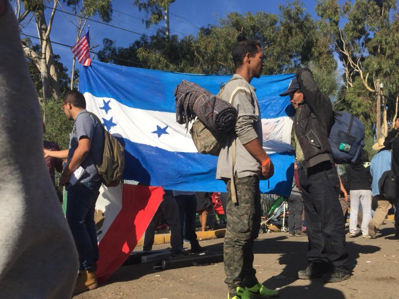 Thousands of migrants traveling in a caravan from Central America arrived at the San Isidro Point of Entry to the United States on November 25, 2018. Photo by Patrick Timmons/UPI