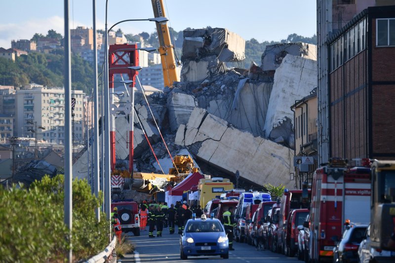 Authorities said a bridge collapse in Genoa, Italy, Tuesday killed dozens -- and some in the Italian government have blamed the roadway's management company. Photo by Luca Zennaro/EPA-EFE