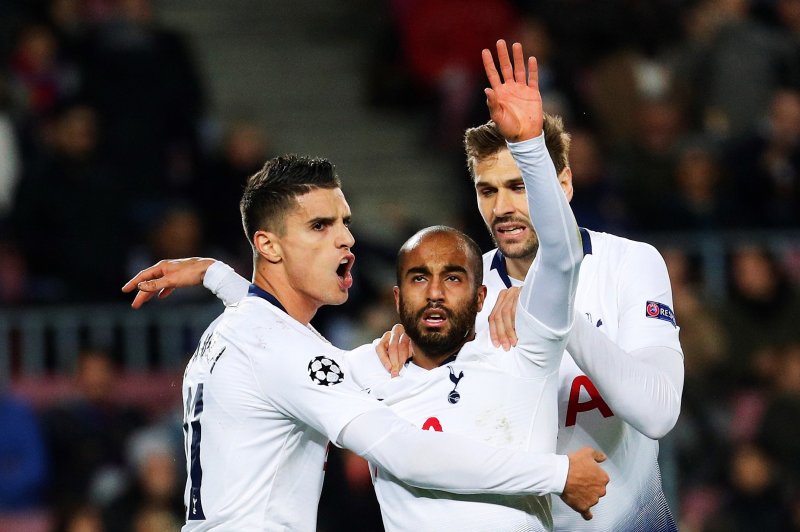 Tottenham Hotspur's winger Lucas Moura (C) celebrates with forward Erik Lamela (L) and forward Fernando Llorente (R) after scoring during the UEFA Champions League group B match between FC Barcelona and Tottenham Hotspur on Tuesday at Camp Nou stadium in Barcelona. Photo by Alejandro Garcia/EPA-EFE