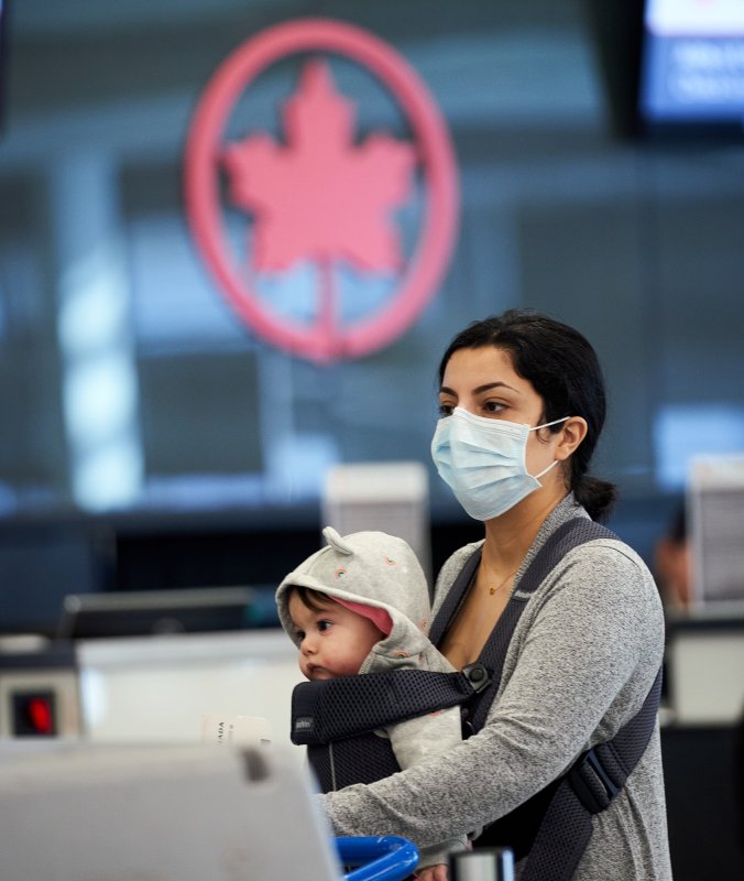 Starting Monday, fully vaccinated Canadians will be able to return home without needing to quarantine. Photo by Andre Pichette/EPA-EFE