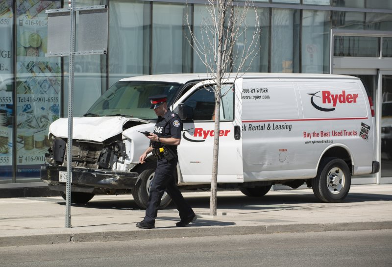 At least 10 killed as van strikes pedestrians in Toronto