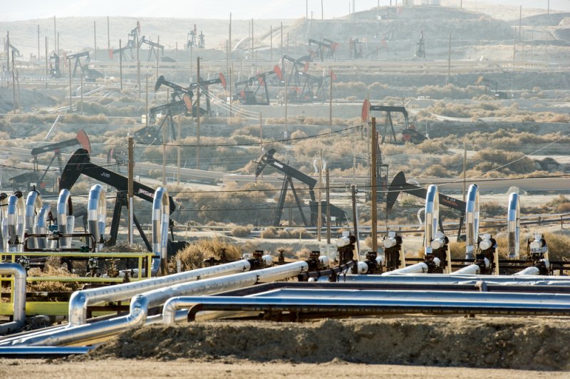 An image of an oil field in Kern County, Calif. The American Petroleum Institute said Thursday it would support a plan for carbon emission pricing. Photo by Christopher Halloran/Shutterstock
