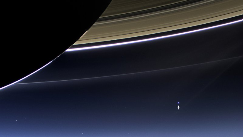 This rare image taken on July 19, 2013, by NASA's Cassini spacecraft has shows Saturn's rings and our planet Earth and its moon in the same frame. At the time, Cassini was 2013 from a distance of about 898.414 million miles (1.445858 billion kilometers) from Earth. It is only one footprint in a mosaic of 33 footprints covering the entire Saturn ring system (including Saturn itself) taken by Cassini's wide-angle camera. (NASA/JPL-Caltech/Space Science Institute)
