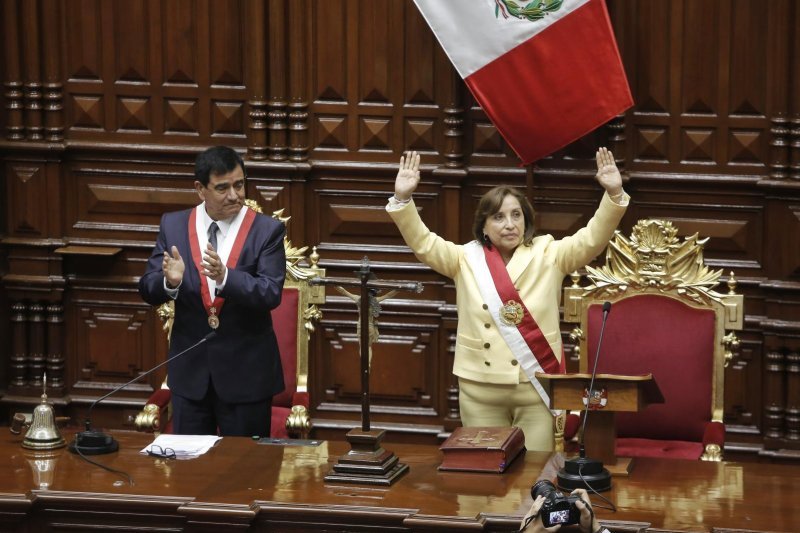 The death toll from ongoing political protests in Peru climbed to 22 on Friday while the country’s new caretaker president Dina Boluarte (R) refused calls to resign. Photo by Paolo Aguilar/EPA-EFE