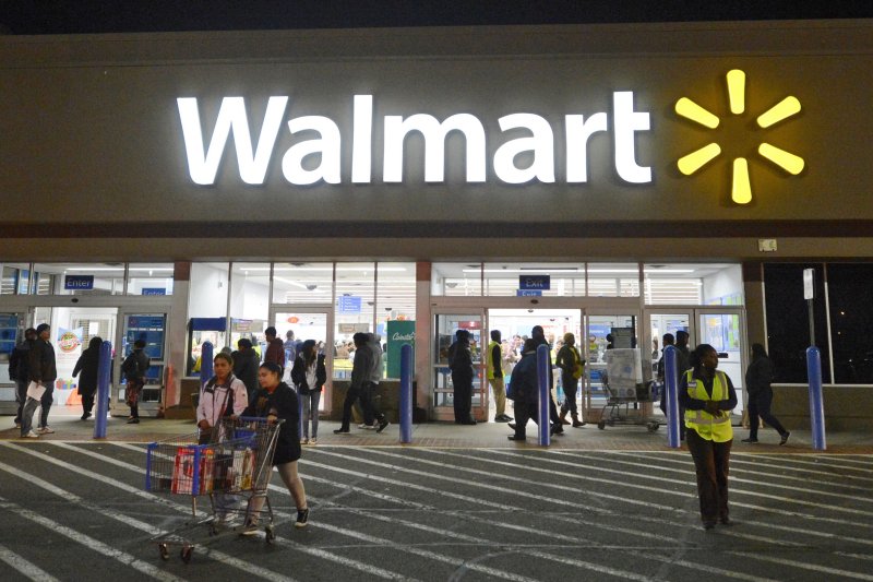 Walmart will increase the minimum wage of store employees from $12 an hour to $14 an hour, according to a memo CEO John Furner posted to the company's website Tuesday. EPA-EFE/Michael Reynolds