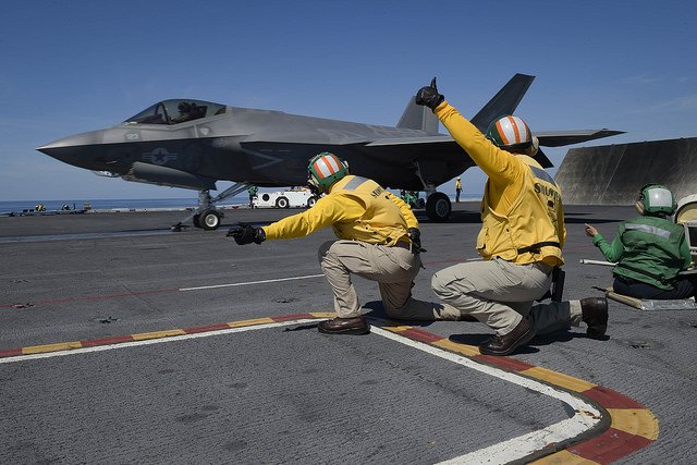 An F-35C Lightning II from the Rough Raiders of Strike Fighter Squadron VFA 125 prepares to launch from the flight deck of the Nimitz-class aircraft carrier USS Abraham Lincoln. Photo by Mass Communication Specialist 1st Class Brian M. Wilbur/U.S. Navy