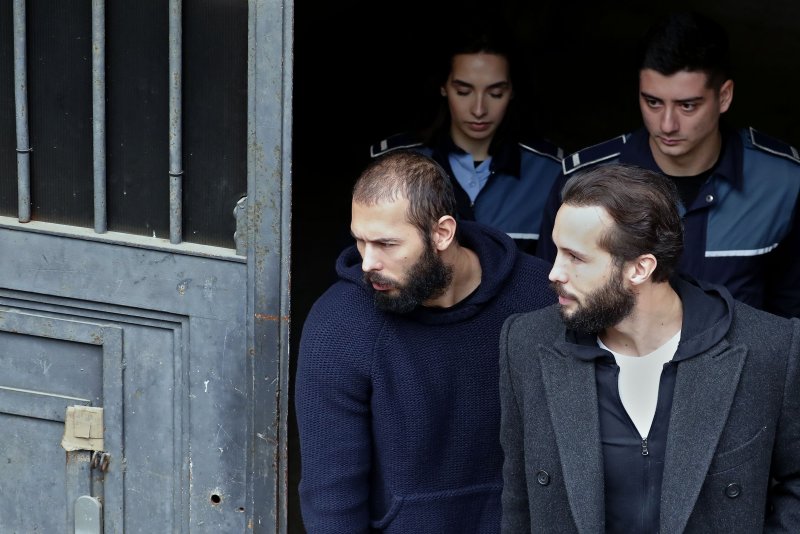 Controversial social media influencer Andrew Tate (L) will be released to house arrest after being held in detention on suspicion of sex-trafficking since December, according to a spokesperson for Romanian law enforcement. File Photo by Robert Ghement/EPA-EFE