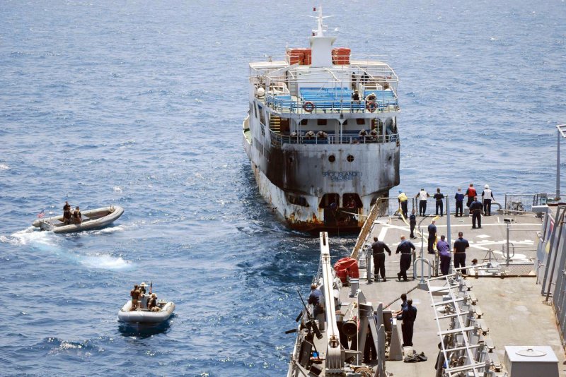 The Guided-missile destroyer USS Stout tows Tanzanian-flagged passenger ferry Spice Island on September 26, 2007, while in international waters off the coast of Somalia. The ferry sank September 10, 2011. File Photo courtesy of the U.S. Navy