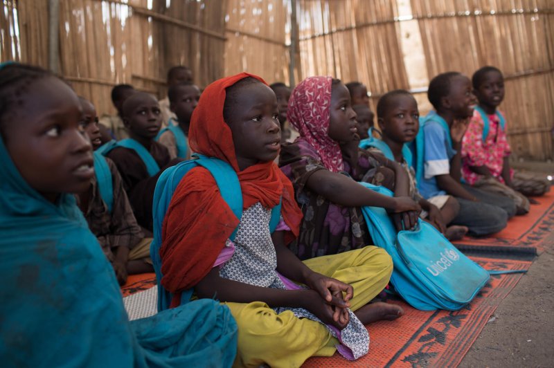 Children attend school in Banki, Nigeria, on Thursday, which was recaptured by the Nigerian military in 2015 from Boko Haram. More than 57 percent of schools that existed in 2009 have yet to reopen after the group's insurgency began, a new U.N. report said Friday. Photo courtesy UNICEF
