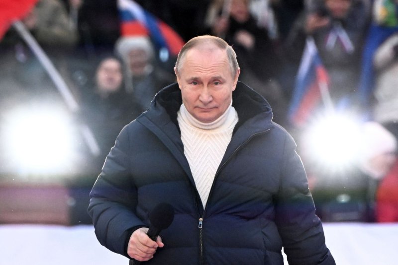 Russian President Vladimir Putin attends a concert marking the 8th anniversary of Crimea's reunification with Russia at the Luzhniki Stadium in Moscow on March 18. In a speech to students, he compared himself to Peter the Great in relation to the Ukrainian invasion. Photo by Sergei Guneyev/EPA-EFE