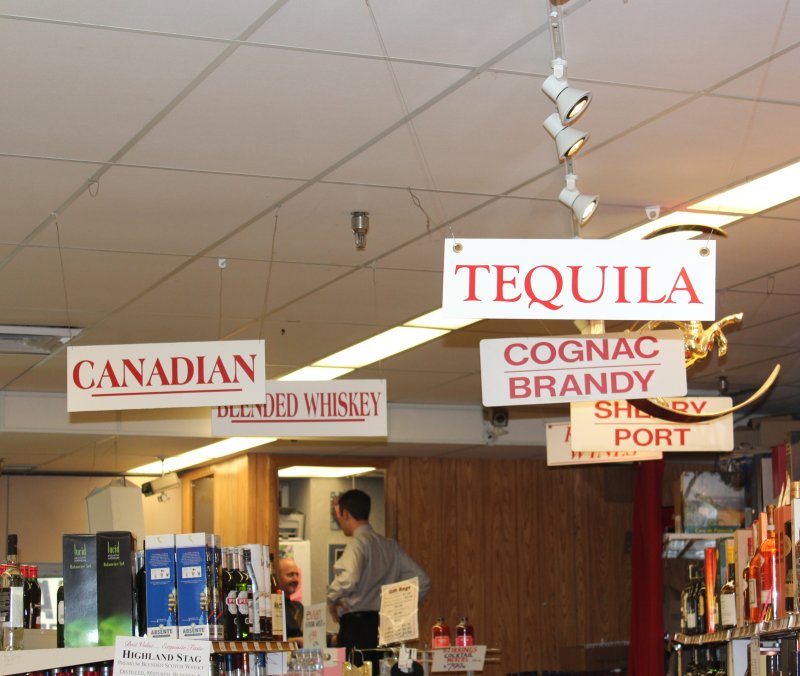 Signs of alcohol at a liquor store in Washington, DC. (UPI/BIllie Jean Shaw)
