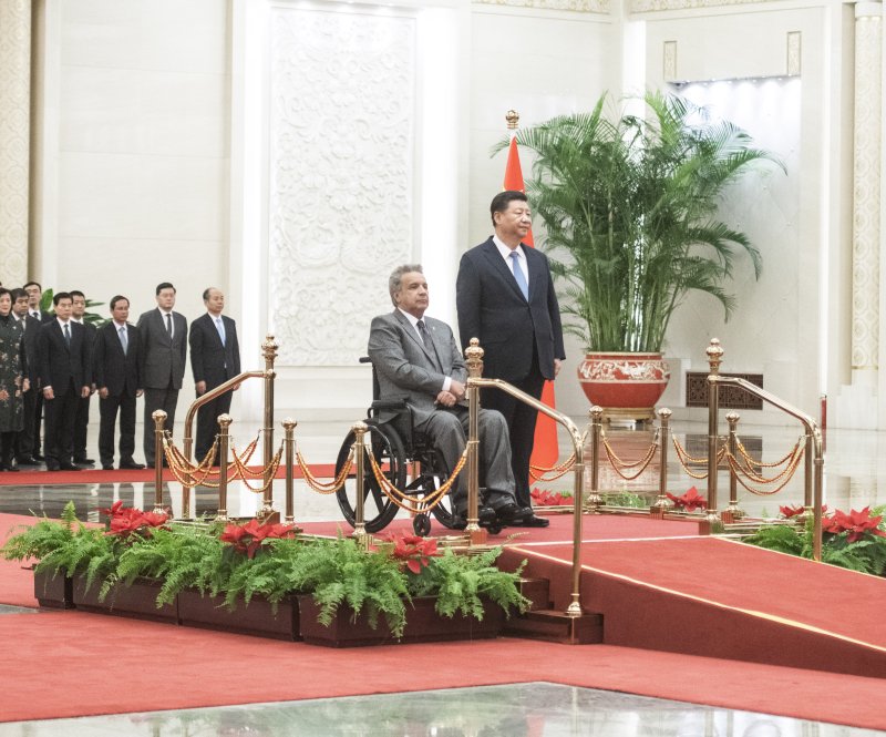 Chinese President Xi Jinping (R) and Ecuadorean President Lenin Moreno are seen at a welcome ceremony Wednesday at the Great Hall of the People in Beijing, China. Photo by Fred Dufour/EPA-EFE/Pool