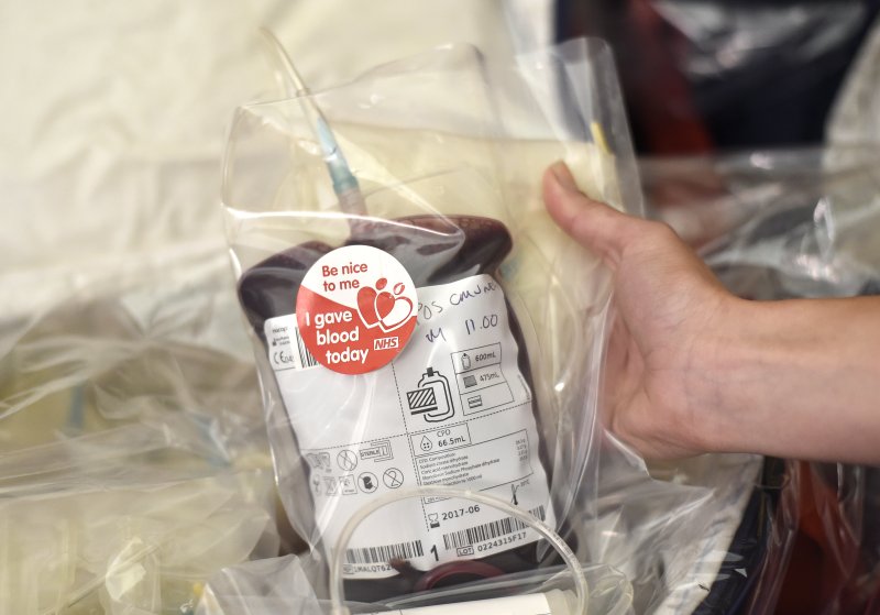 A nurse holds a bag of blood (unit) at a blood donor center in Brewers Hall in London, Britain.&nbsp; File Photo by Facundo Arrixabalaga/EPA