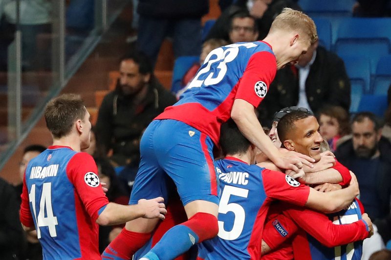 CSKA's players celebrate during the UEFA Champions League group G match between Real Madrid and CSKA Moscow on Wednesday at Santiago Bernabeu Stadium in Madrid. Photo by J.P. Gandul/EPA-EFE