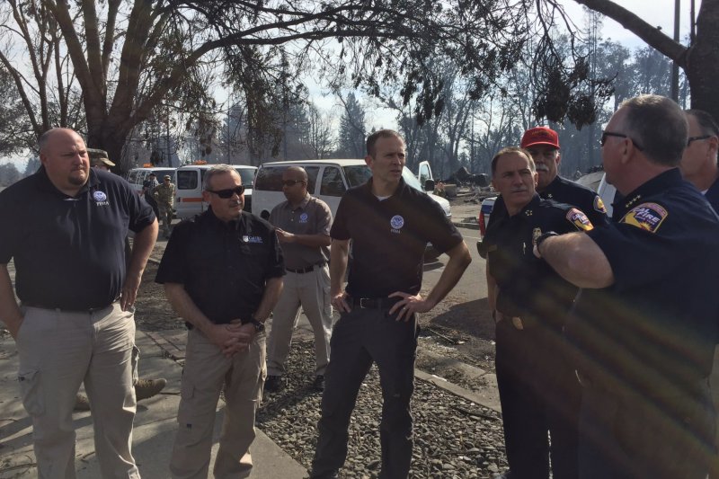 Trump praises first-responders as FEMA head tours fire-devastated California