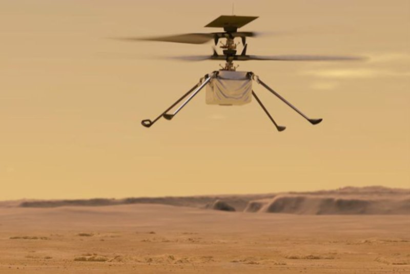 An illustration depicts NASA's Mars helicopter Ingenuity flying on the Red Planet. File Image courtesy of NASA