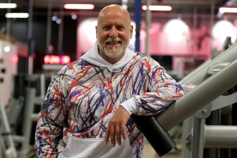 Rainer Schaller, founder and CEO of RSG Group, which includes the McFit brand, poses at the McFIT gym in Cologne, Germany, in May 2020. File Photo by Friedemann Vogel/EPA-EFE