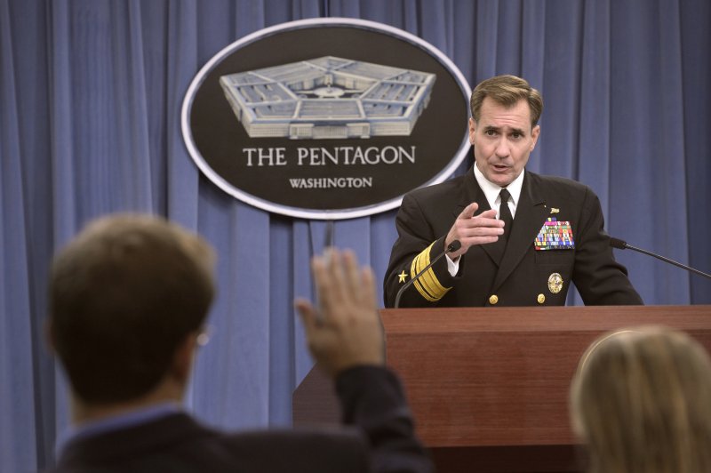 U.S. Navy Rear Adm. John Kirby, the Pentagon press secretary, gives a briefing and answers questions for the media on events within the Department of Defense, the Middle East and Africa during his weekly press conference at the Pentagon in Arlington, Va., Oct. 3, 2014. On June 9, 2015, Kirby told MSNBC that efforts in Iraq against the Islamic State could take three to five more years. File photo courtesy the U.S. Department of Defense.