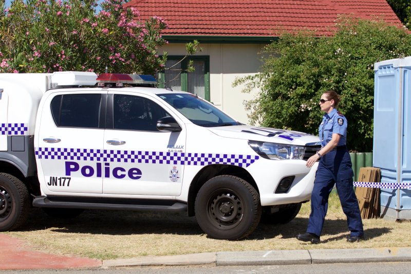Police search a house that reportedly belonged to the parents of 48-year-old Bradley Robert Edwards who was charged with two murders in the notorious Claremont serial killings. He was also charged with two counts of deprivation of liberty, two counts of aggravated sexual penetration without consent, one count of breaking and entering and one count of indecent assault in attacks on two other women. Photo by Richard Wainwright/European Pressphoto Agency