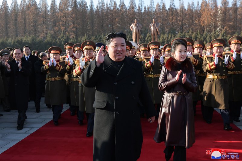 North Korean leader Kim Jong Un warned he would "put an end" to South Korea if attacked, state media reported Friday. He made the remarks at the 76th-anniversary ceremony for the Korean People's Army, where he was accompanied by his daughter Ju Ae (R). Photo by KCNA/EPA-EFE