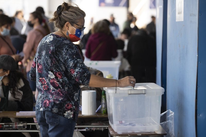 Chileans took to the polls Sunday to vote on whether the country should adopt a new left-leaning constitution that would enshrine an unprecedented number of rights. Photo by Alberto Valdes/EPA-EFE