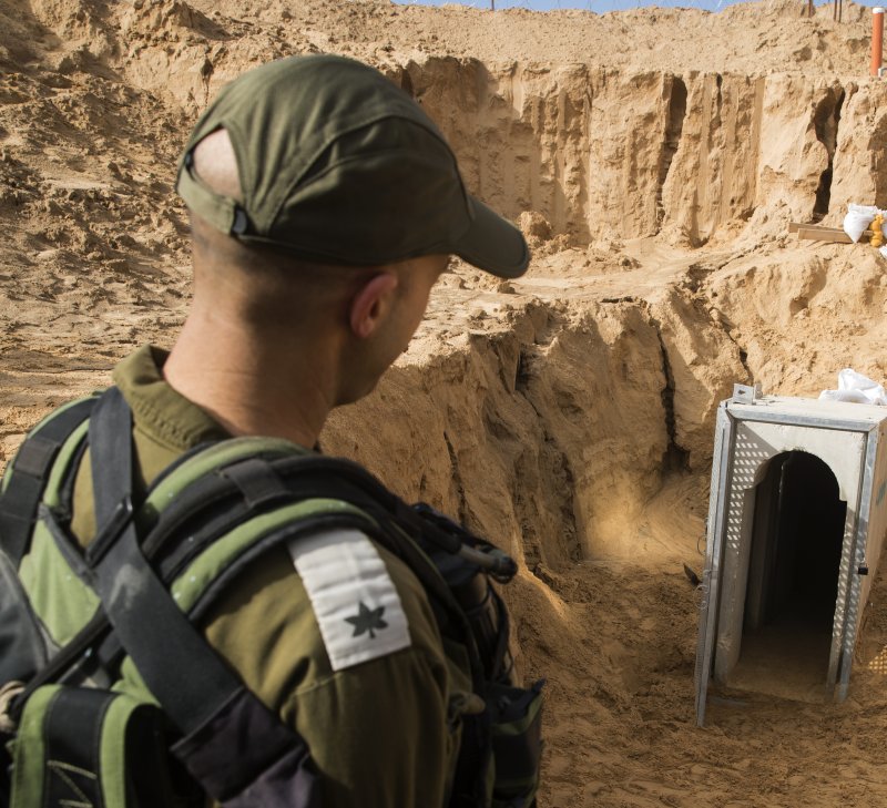 An Israeli army officer looks at the entrance of a tunnel dug out by a militant group leading from the Palestinian enclave into Israel on January 18. Israeli officials said Thursday they've found a similar tunnel from Lebanon. File Photo by Jack Guez/EPA-EFE/Pool