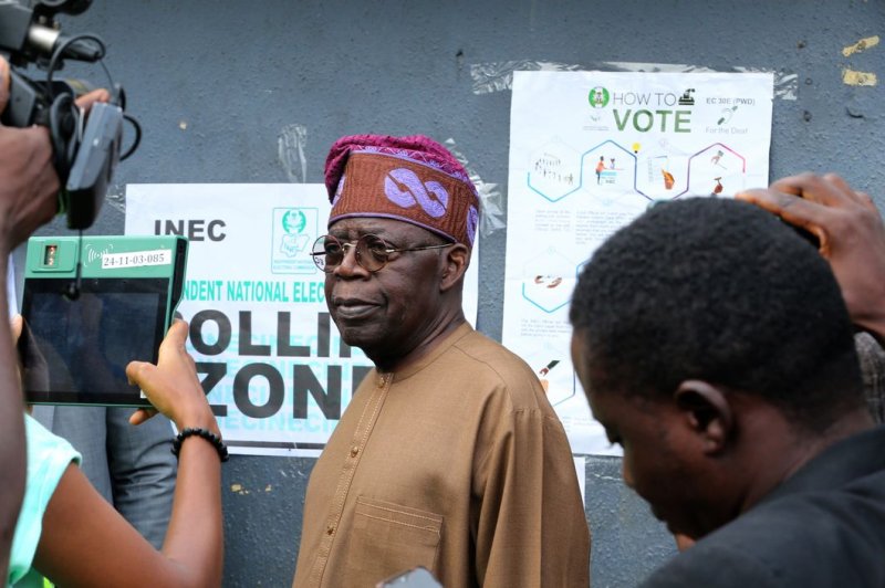 Nigerian then-President-elect Bola Ahmed Tinubu is shown arriving to cast his vote at a polling unit in Lagos on March 18. He was inaugurated Monday promising to tackle the nation's many economic problems. File Photo by Akintunde Akinleye/EPA-EFE