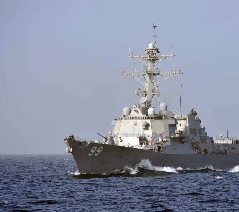 The guided missile destroyer USS Farragut and three Cyclone-class patrol boats are no longer accompanying U.S. commercial vessels through the Strait of Hormuz. File photo by Mass Communication Specialist 2nd Class Deven B. King/U.S. Navy